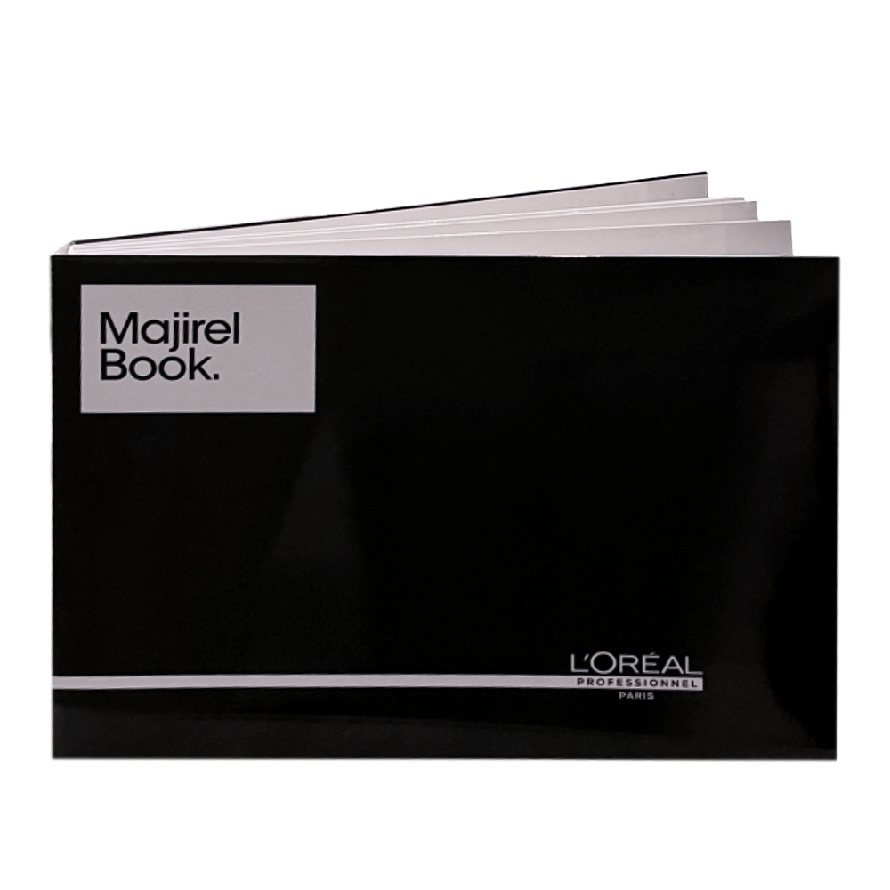 Black book with 'Majirel Book' and 'L'Oreal Professionnel' branding on a white background